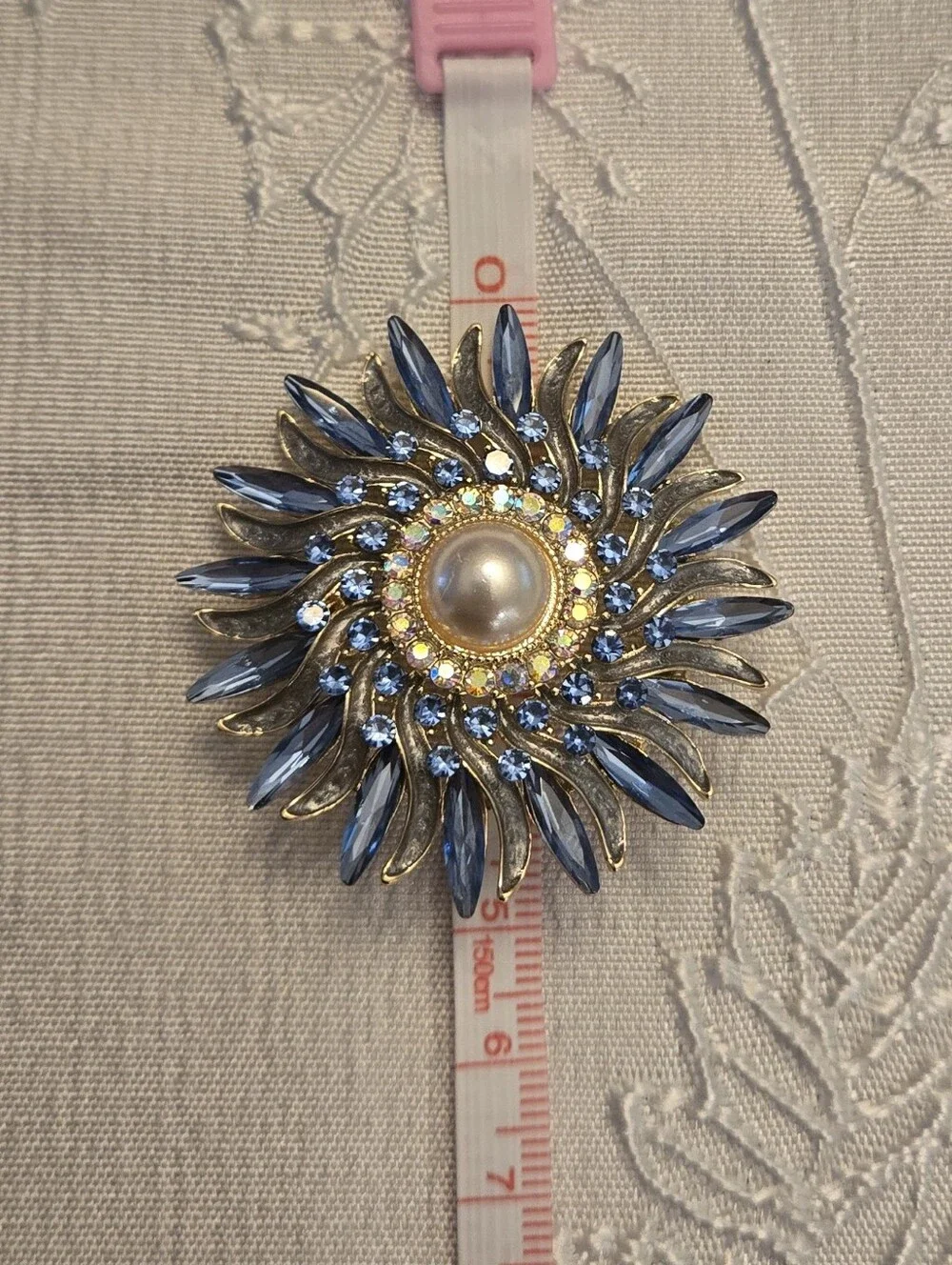 Gold-Tone Blue Crystal and Pearl Sunburst Brooch